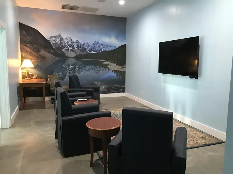Resident lounge with sofas and television